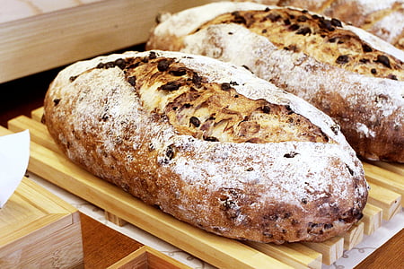 oval baked bread on brown wooden rack thumbnail