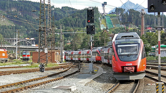 orange train on rail thumbnail