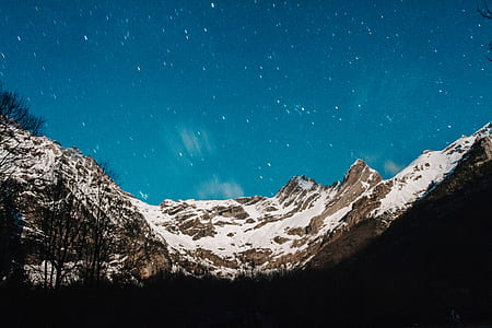 landscape photography of mountain and trees during daytime thumbnail