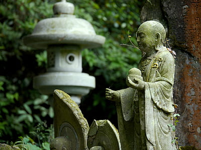 shallow focus photo of statue thumbnail