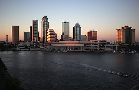 city buildings near body of water thumbnail