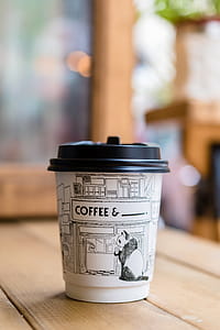 Panda Printed Paper Coffee Cup on Table thumbnail