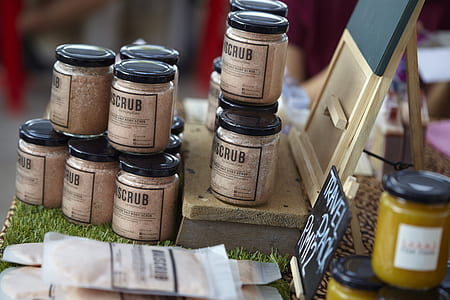 assorted glass jars on brown wooden surface thumbnail