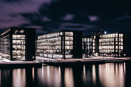 high-rise building near body of water thumbnail