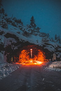 lighted tunnel covered with snow thumbnail