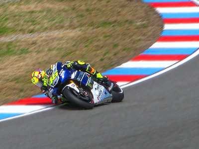 rider banking sport motorcycle on track thumbnail