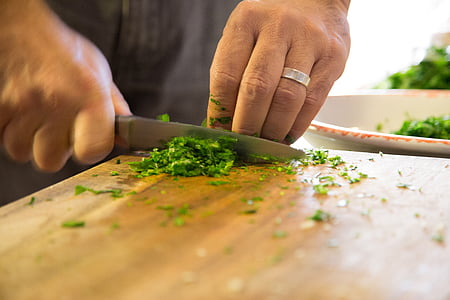 person chopping vegetable using gray knife thumbnail