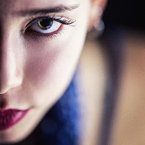 shallow focus of woman wearing red lipstick thumbnail