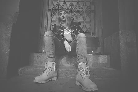 woman sitting in stairs near door thumbnail
