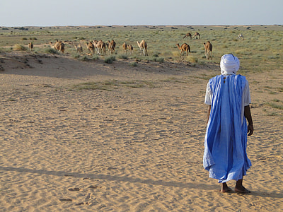 person in blue robe thumbnail