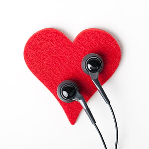 black earphones on red heart decor thumbnail