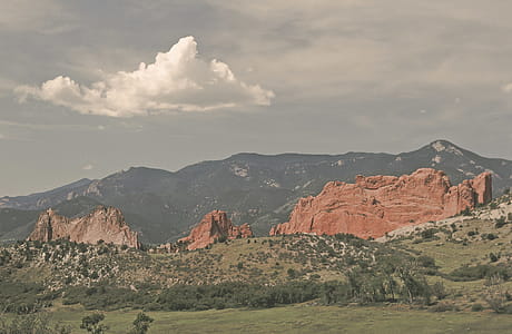 Red cliffs and green hills. Faded processing. thumbnail
