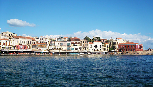 body of water near white buildings thumbnail