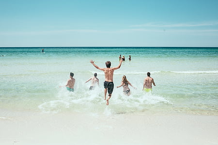 people running towards sea thumbnail