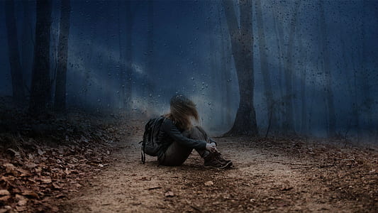 woman sitting on brown soil thumbnail