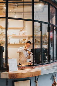 man pouring liquid on cup thumbnail