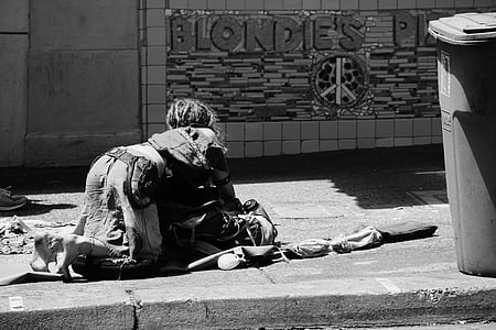 woman kneeling on concrete floor thumbnail