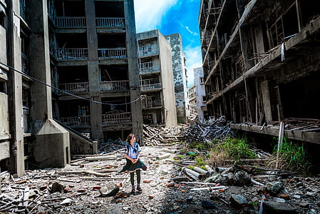 girl wearing blue dress on gray concrete ground thumbnail