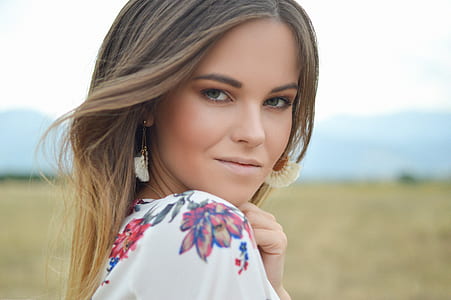 shallow focus photography of woman smiling thumbnail