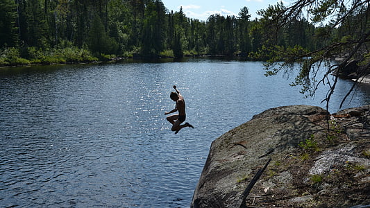 person jumps on body of water thumbnail