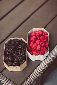 Raspberries And Blueberries On Top Of Table thumbnail