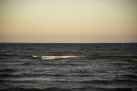 Waters of Lake Michigan and horizon at Dusk at J.W. Wells State Park, Michigan thumbnail
