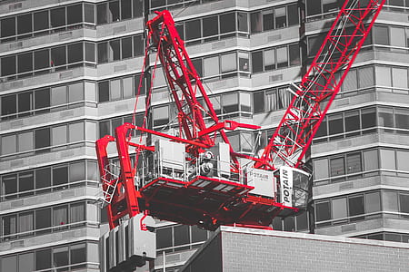 red and white building crane thumbnail