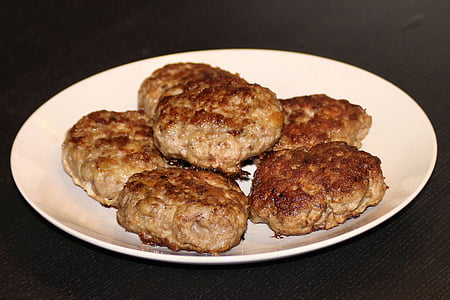 five fried patties in white ceramic plate thumbnail