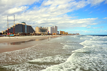 buildings near ocean water during daytime thumbnail