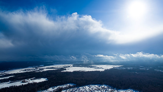 aerial photography of snow covered buildings during daytime thumbnail