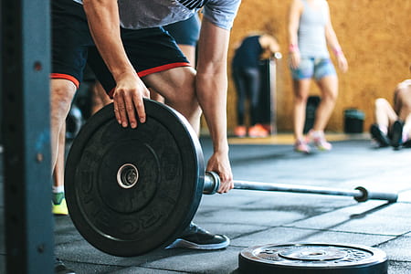 Man Holding Black Barbell thumbnail