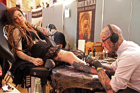 woman having tattoo session thumbnail