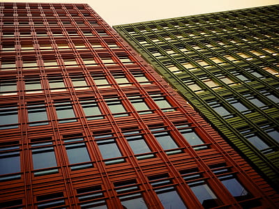 brown and green concrete building thumbnail