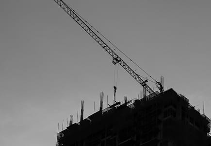 Metal Crane on Top of Building thumbnail