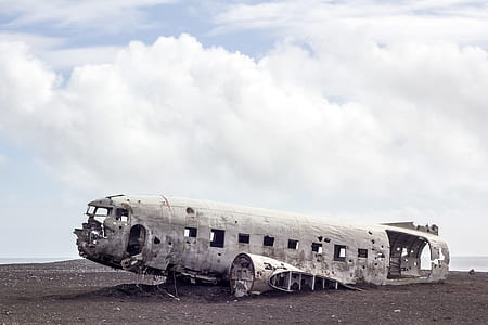 crashed airplane under white cloudy sky thumbnail