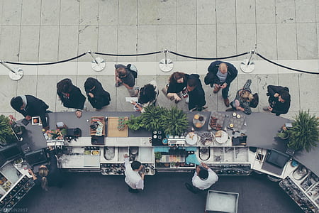people standing near buffet counter thumbnail
