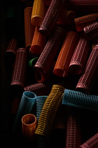 photo of assorted-color plastic hair rollers thumbnail