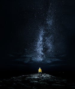 man standing on cliff thumbnail