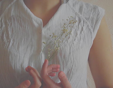 woman in white and green sleeveless top thumbnail