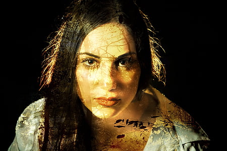 close up photo of woman's face with tree lightning effect and black background thumbnail