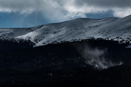 snow covered mountain during daytime thumbnail