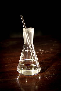 clear glass measure cup on brown surface thumbnail