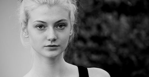 grayscale photo of woman wearing tank top thumbnail