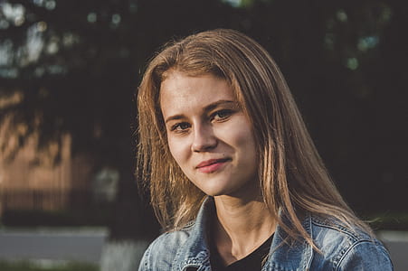 Woman Wearing Blue Denim Jacket thumbnail