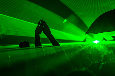 group of people dancing on green neon laser lights thumbnail