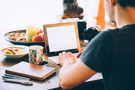 man using laptop on table thumbnail