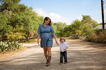 woman walking with child thumbnail