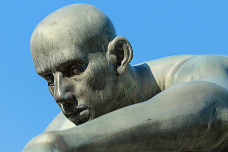 gray concrete statue during daytime thumbnail