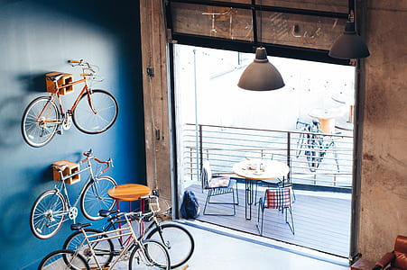 five bicycles near 3-piece dining set thumbnail