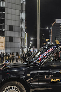 black car on street during night time thumbnail